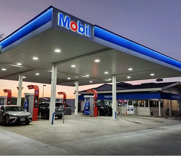 Gas station branding project in California with illuminated canopy and price signage