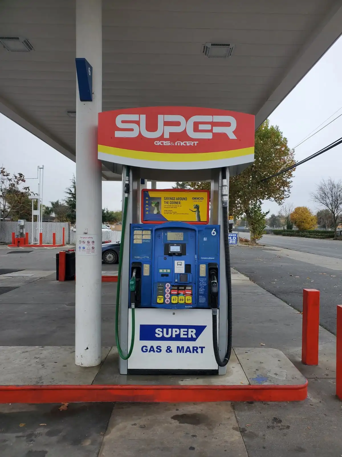 Gas station dispenser graphics project completed by AA Sign Image
