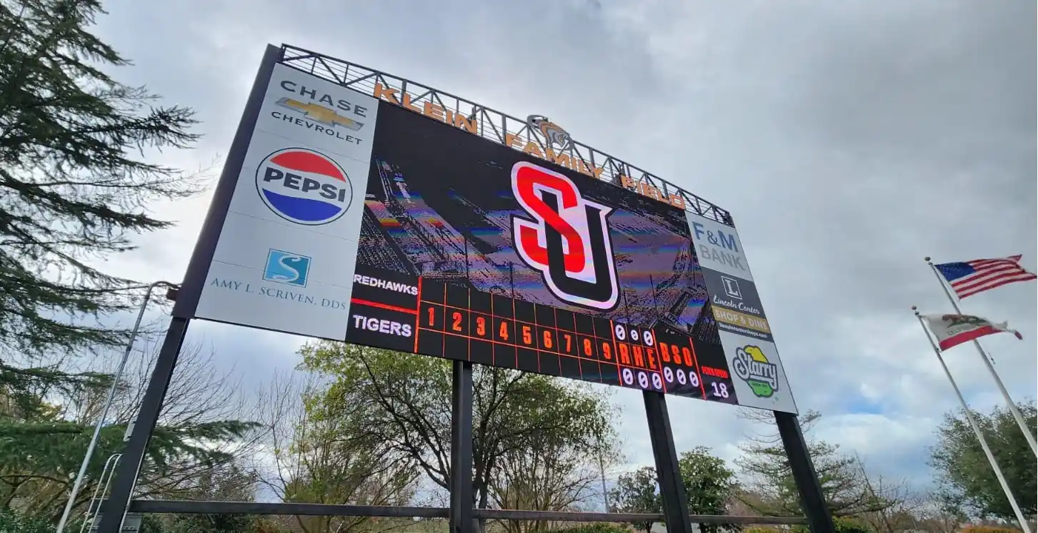 Commercial signage project with illuminated branding elements